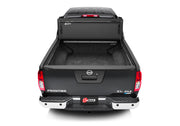 Black truck with open trunk box, bak 2022 nissan frontier 5ft bed bakflip mx4 matte finish