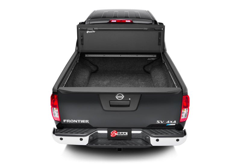 Black truck with open trunk box, bak 2022 nissan frontier 5ft bed bakflip mx4 matte finish