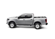 Silver pickup truck installed on a bak 2022 nissan frontier 5ft bed bakflip mx4 matte finish