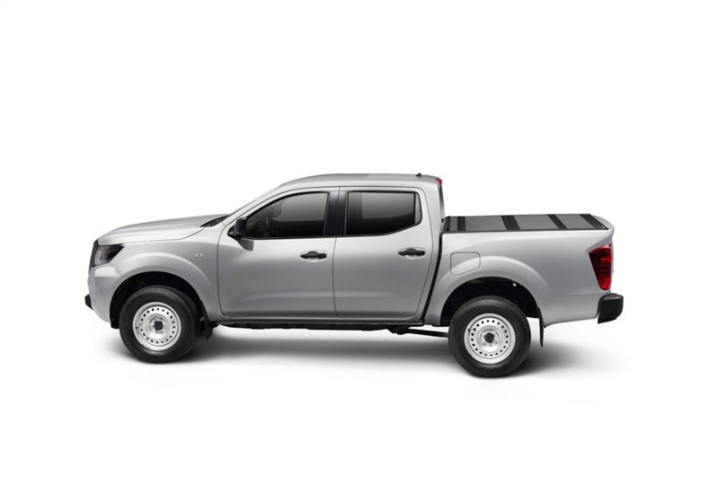 Silver pickup truck installed on a bak 2022 nissan frontier 5ft bed bakflip mx4 matte finish