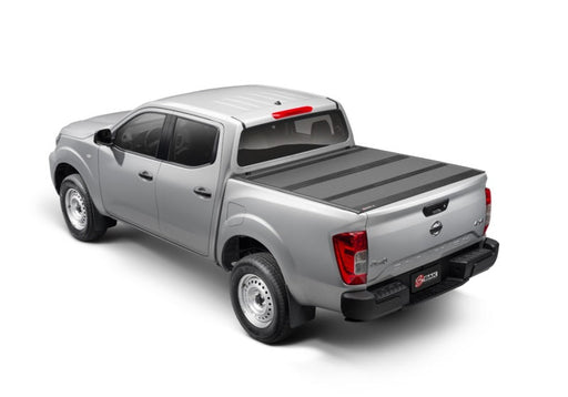 2022 nissan frontier 6ft bed bakflip mx4 matte finish truck bed on white background