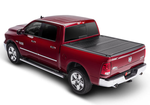 Red truck with black bed cover - bak 2022+ toyota tundra 5.5ft bed bakflip f1 bed cover