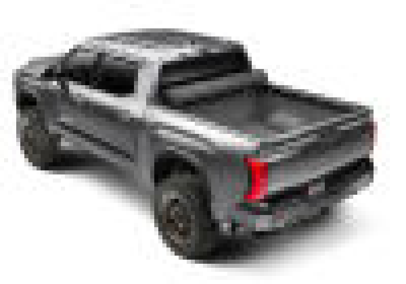 Black truck with red stripe featuring bak 2022+ toyota tundra 5.5ft bed revolver x4s bed cover