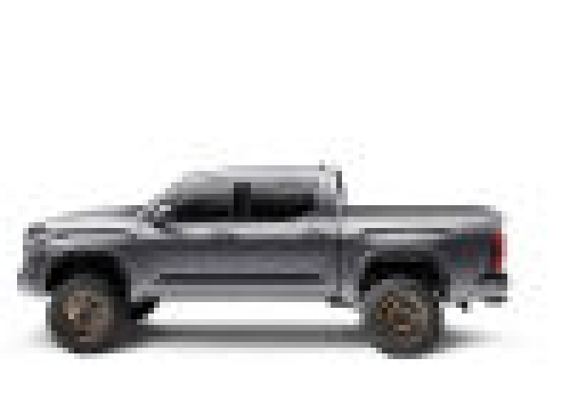 Toy truck with white background next to bak 2022+ toyota tundra 5.5ft revolver x4s bed cover