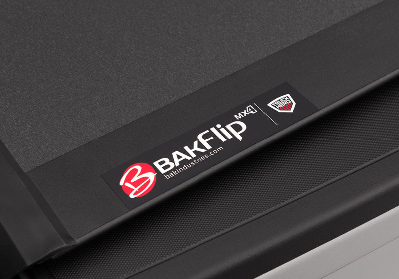 Black and white chevy colorado crew cab with bakflip mx4 matte finish logo