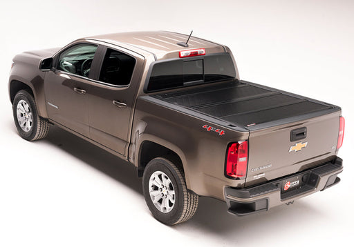 Black bed cover on chevy colorado crew cab truck