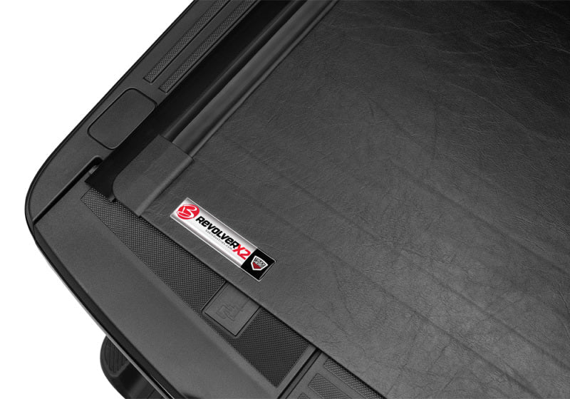 Black truck bed cover on bak 21-22 ford f-150, sticker on back