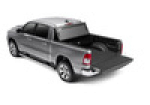 Toy car with red light on top displayed in bak 94-18 dodge ram (w/o ram box) 6ft 4in & 8ft