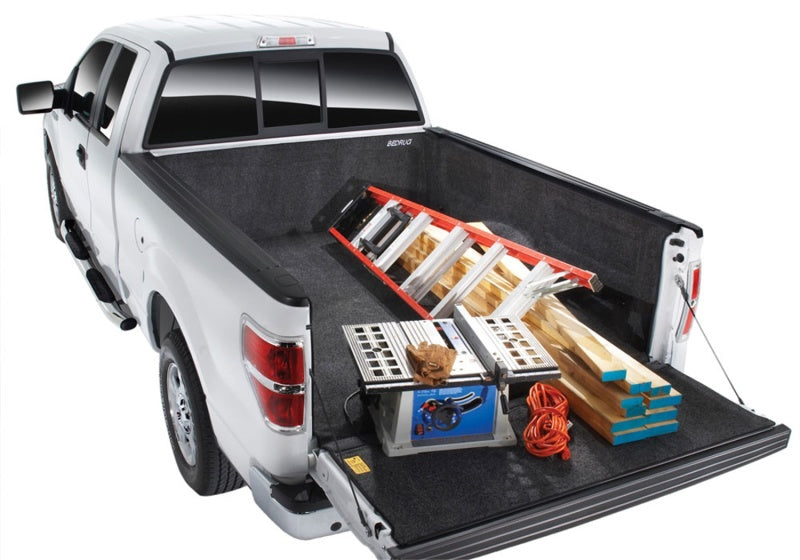 Ford f-150 truck with tool box in the back, compatible with bedrug bedliner