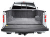 White truck with large open trunk - bedrug ford f-150 6.5ft bedliner