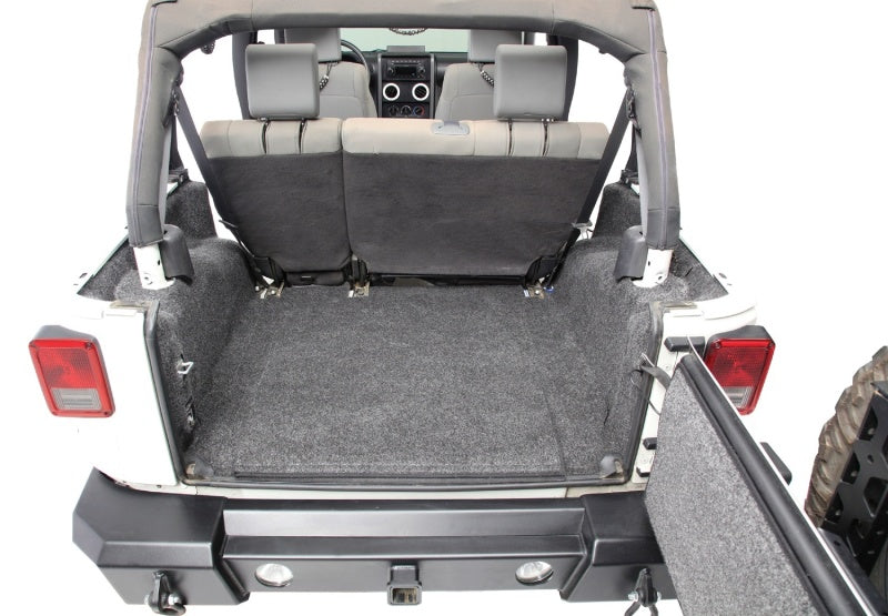 Trunk compartment of jeep wrangler with bedrug cargo kit installed