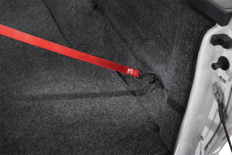 Red tape securing rear seat belt in bedrug 08-16 ford superduty 6.5ft short bed w/factory step gate bedliner