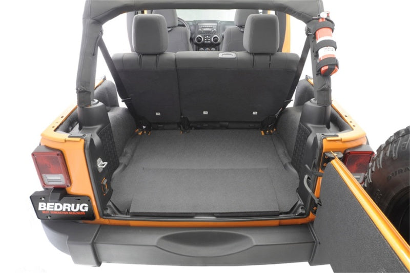 Jeep wrangler rear cargo kit with folded back seat