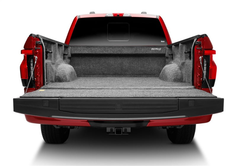Red truck with open trunk compartment - bedrug 15-23 ford f-150 5.5ft bed bedliner