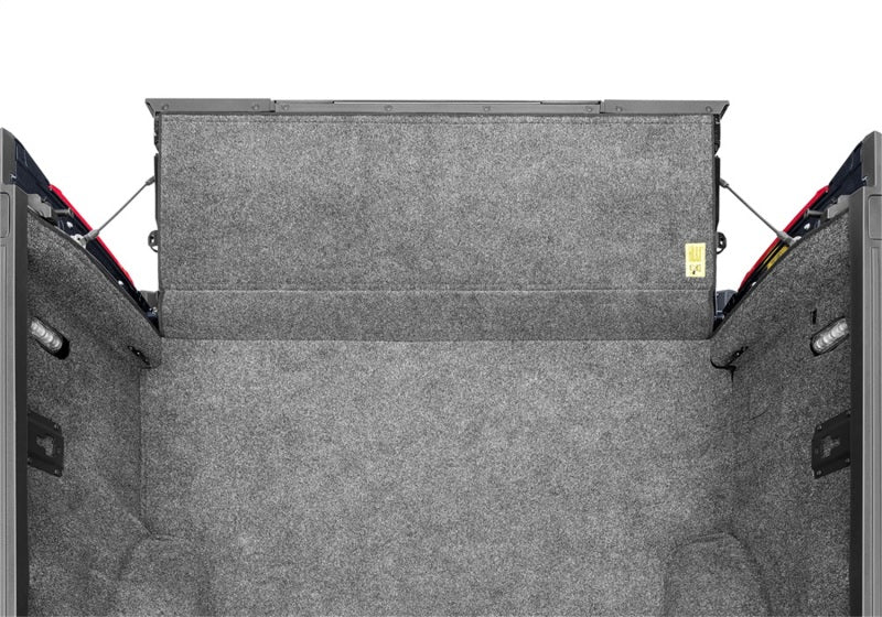 Bedrug 15-23 ford f-150 6.5ft bed bedliner installation instructions on a car trunk