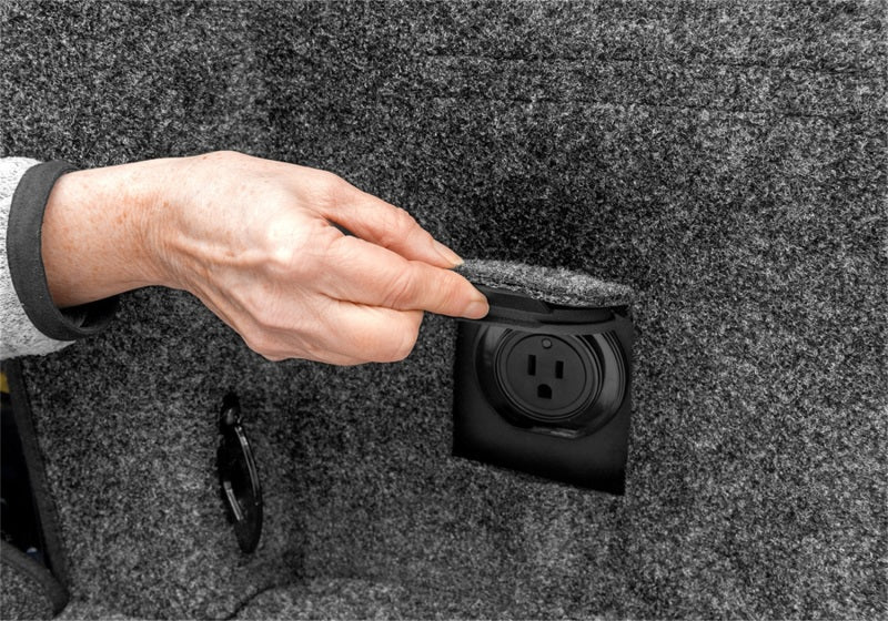 Person opening car door with bedrug 15-23 ford f-150 6.5ft bed bedliner