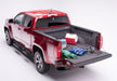 Red truck with tool in bed displayed in bedrug 17-23 chevrolet colorado 61.7in bedliner