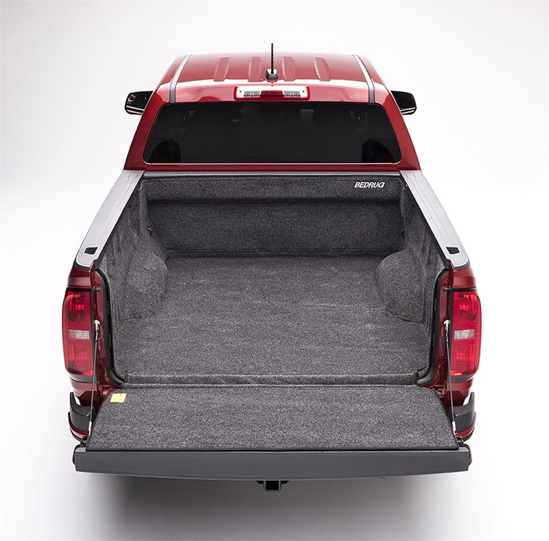 Red truck with open trunk bedrug 17-23 chevrolet colorado bedliner