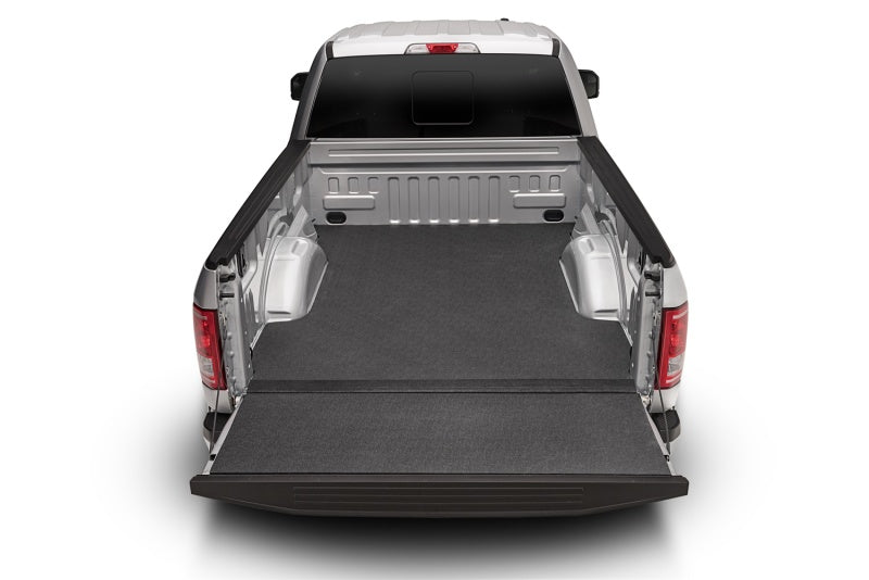 Silver 2020 ford escape with bedrug truck bed impact mat