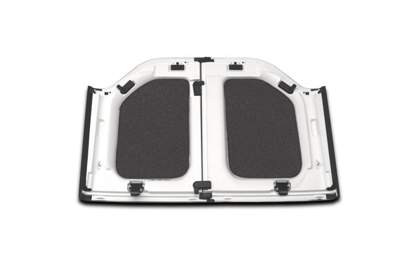 White jeep wrangler jl 4-door headliner with black plastic seat - rear view