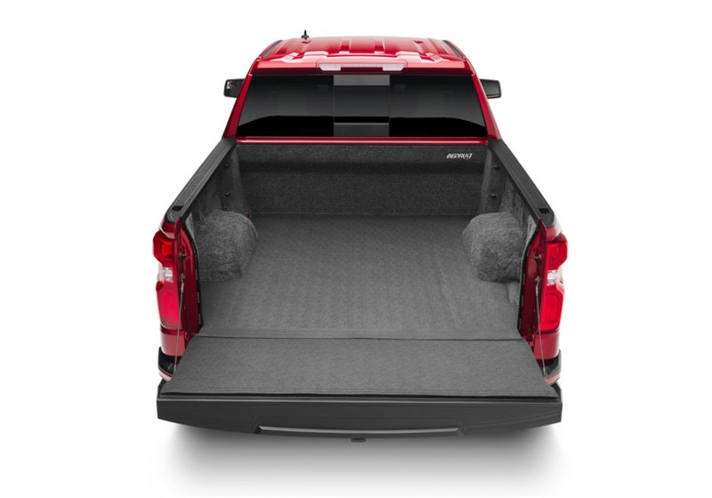 Bedrug 19-23 chevrolet gmc 1500 5ft 8in bed impact bedliner - rear view of red car with open trunk