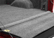 Bedrug 20-23 gm silverado/sierra hd 6ft 9in bed w/ multi-pro tg bedliner trunk area with compartment open