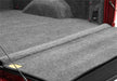 Bedrug 20-23 gm silverado/sierra hd 6ft 9in bed w/ multi-pro tg bedliner trunk area with compartment open
