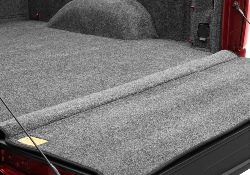 Open trunk compartment of bedrug in 2020-2021 chevrolet silverado/sierra hd with multi-pro tailgate