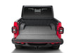 Red jeep gladiator 5ft truck bed mat with open trunk - bedrug impact mat for jeep wrangler