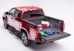 Red truck bed liner with tool in back - bedrug jeep gladiator jt 5 foot full bed liner