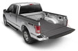 Close up of a truck bed impact mat for 2005+ toyota tacoma with bedtred design