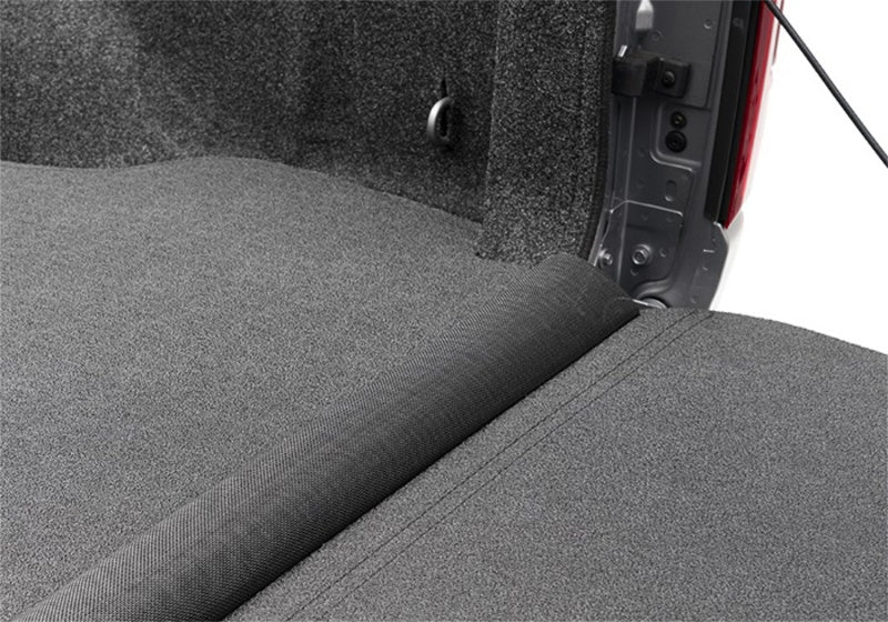 Ford f-150 5.5ft bed impact bedliner with folded back seat in truck