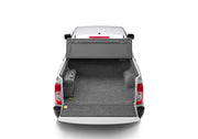 White truck with open trunk compartment - bedrug nissan frontier/navara 5ft bed bedliner