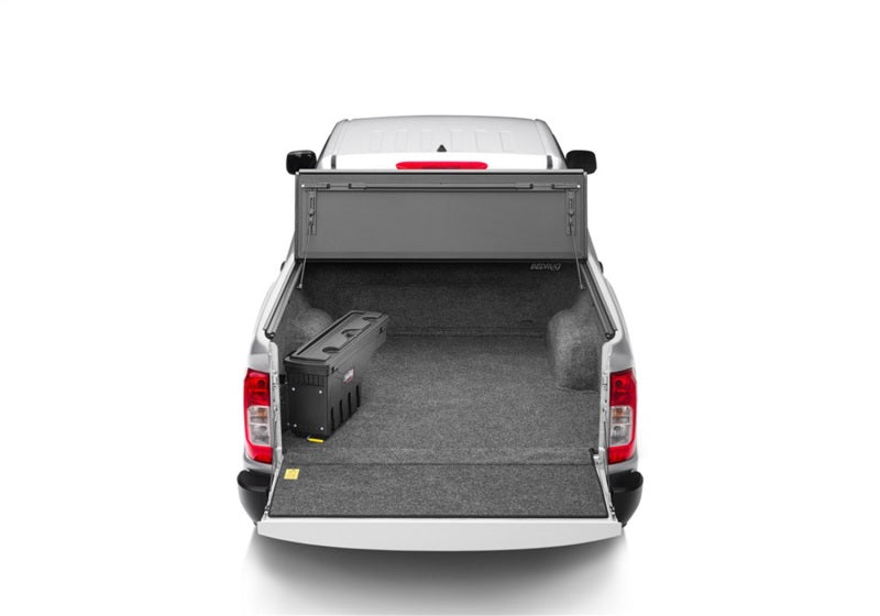White truck with open bed | bedrug 22-23 toyota nissan frontier/navara 5ft bed bedliner