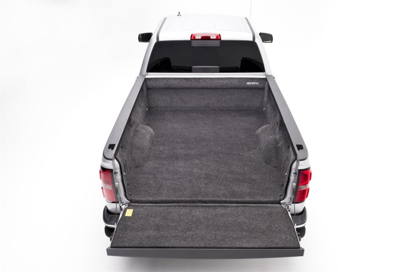 Bedrug gmc sierra classic short bed bedliner - white truck with black bed viewed from back end