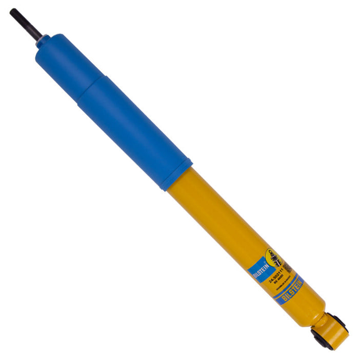 Bilstein 19-21 ram 2500 b6 4600 shock rear - yellow shock absorber with blue rubber on white background