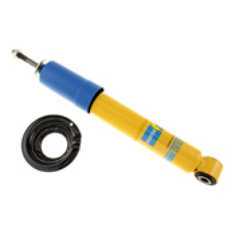 Yellow shock absorber with black rubber ring from bilstein 4600 series for nissan pathfinder