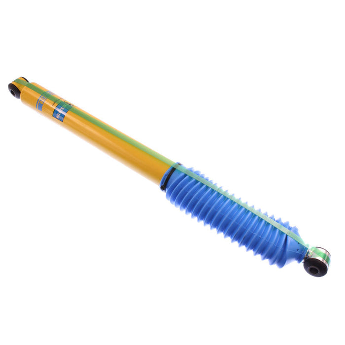 Blue and yellow pen with yellow handle on bilstein 4600 series 09-13 ford f-150 rear 46mm monotube shock absorber