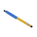 Blue and yellow pen with black tip on warranty material safety sheet for bilstein 4600 series shock absorber