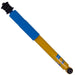 Bilstein 4600 series front shock absorber with blue and yellow plastic water bottle