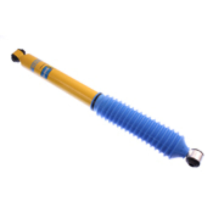 Bilstein 4600 series rear 46mm monotube shock absorber with yellow and blue shock absorb on white background