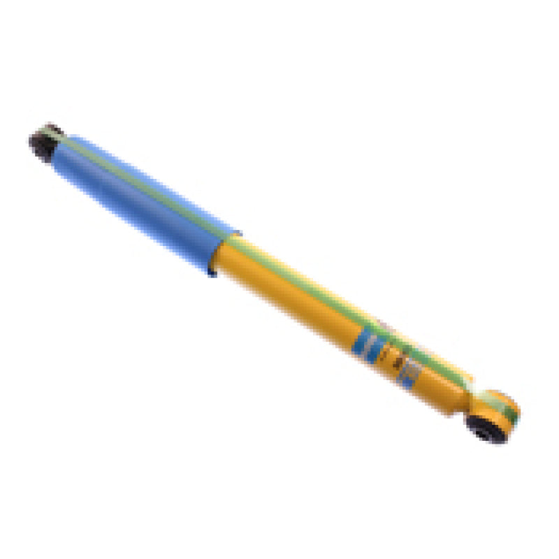 Blue and yellow pen with black tip on bilstein 4600 series 2004 dodge ram 1500 st rear 46mm monotube shock absor