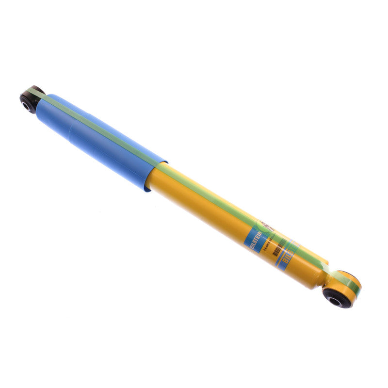 Yellow and blue pen with black tip on bilstein 4600 series 2004 dodge ram 1500 st rear 46mm monotube shock absor