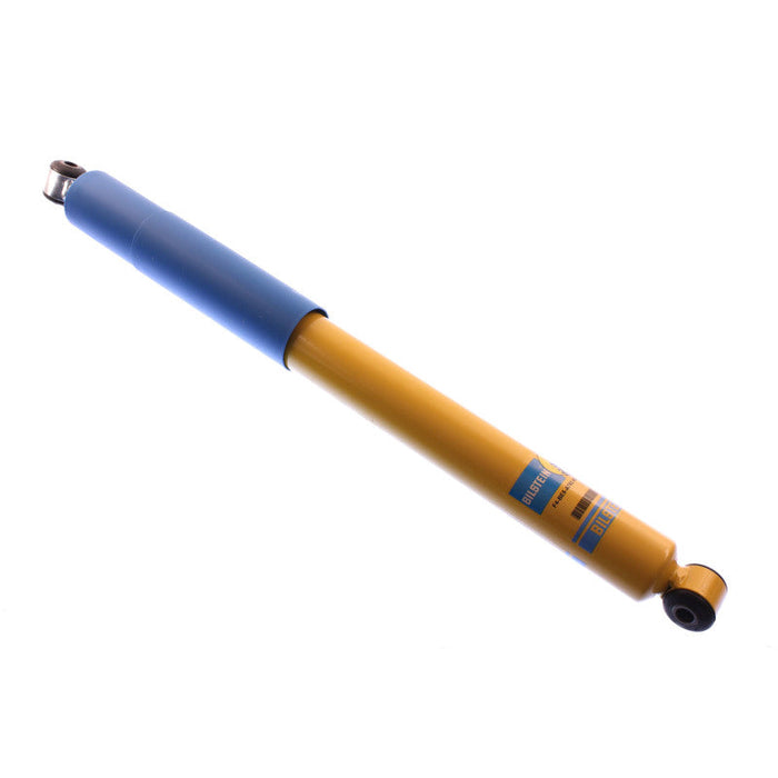 Blue and yellow pen with black tip on bilstein 4600 series shock absorber