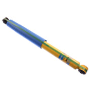 Blue and yellow pen with black tip