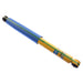 Blue and yellow pen with black tip