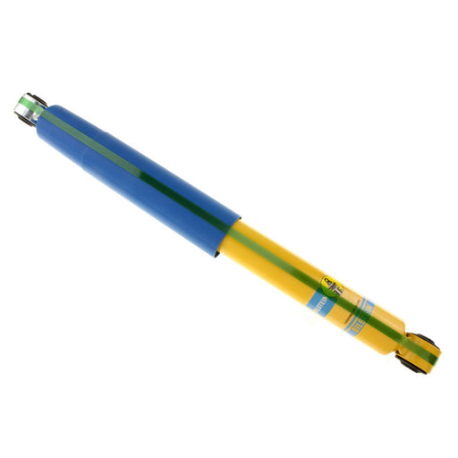 Yellow and blue pen with black tip on bilstein 4600 series shock absorber