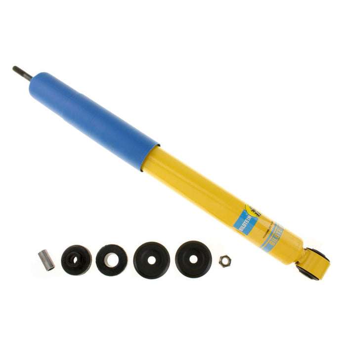 Blue and yellow hydraulic cylinder with black rubber wheels from bilstein 4600 series shock absorber