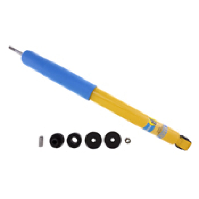 Blue and yellow pen with a black ball on top of bilstein 4600 series 2014 dodge ram 2500 rear 46mm monotube shock