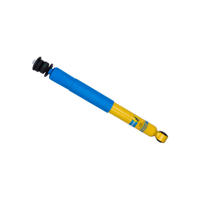 Bilstein 4600 series blue and yellow shock absorber on white background in close up view